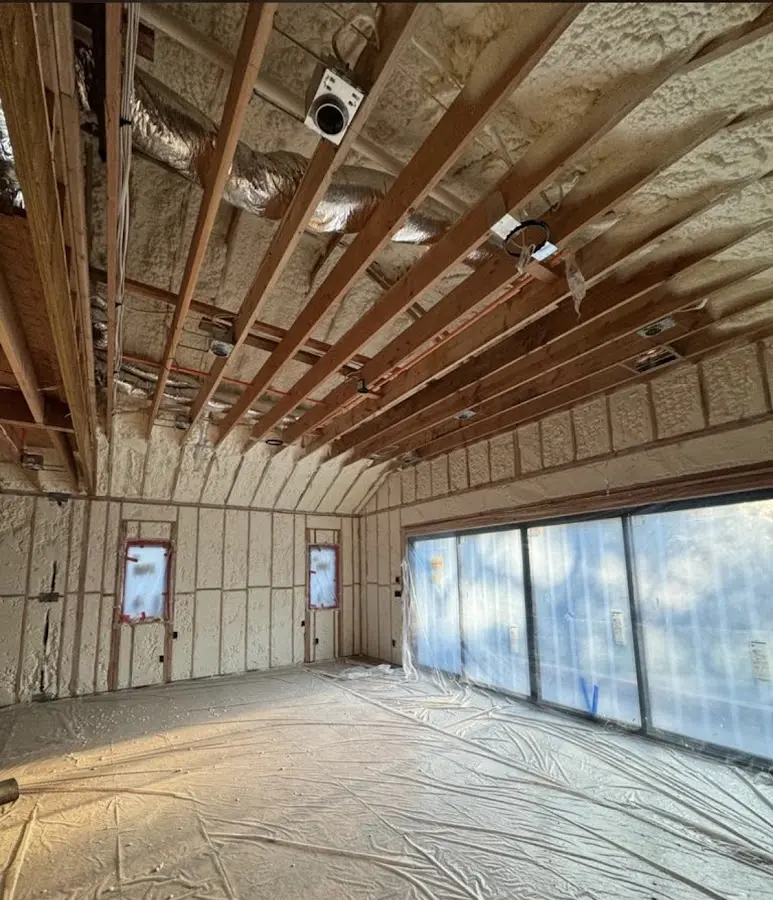 Interior walls and ceiling insulated with spray foam during new construction in Daphne